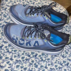 Blue Hoka One One tennis shoes